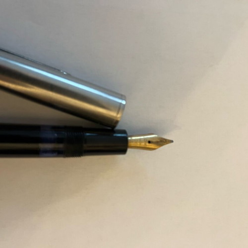 Pen with 14kt gold nib old used with piston