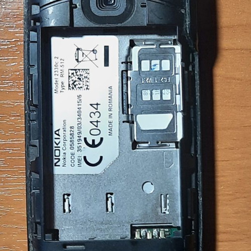 Nokia 2330c-2 cell phone used, working with battery and charger