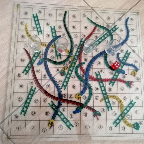 Glass Snakes & Ladders board game used with shot glasses