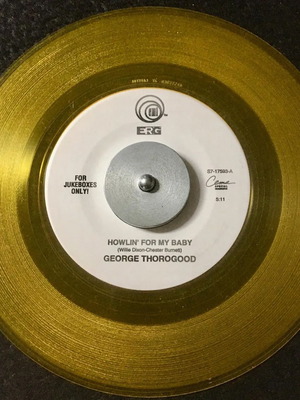 George Thorogood Howlin' For My Baby / Baby Don't Go vinyl like new, 7", 45 RPM, jukebox, yellow translucent