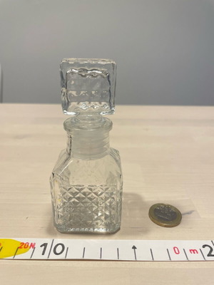 Small glass jar new with airtight lid