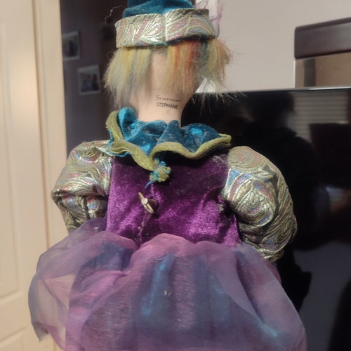 Harlequin porcelain music doll Symphony like new