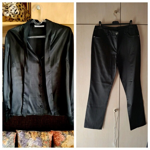 More women's set black shirt and pants like new, size Large