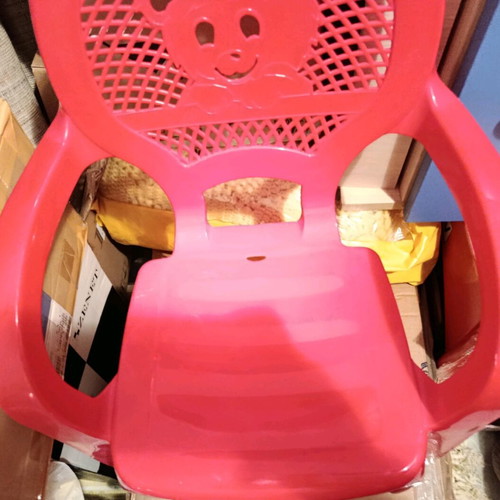 Children's chair used, red plastic with arms and Minnie design