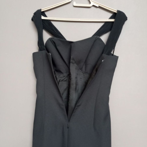 Multifunctional black dress with vintage gold earrings