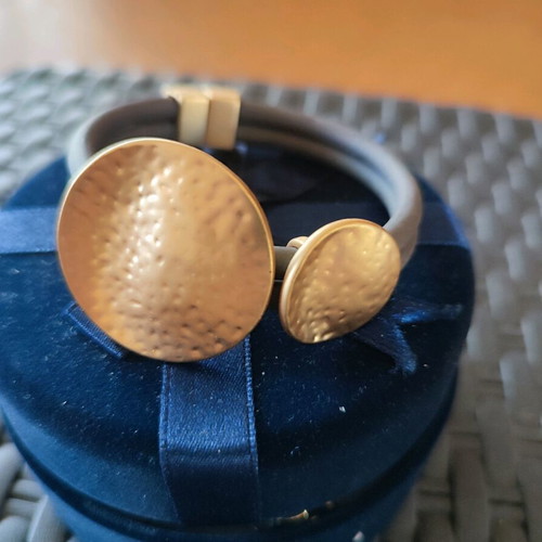 Bracelet with magnetic clasp, leather strap, gold-plated designs, like new