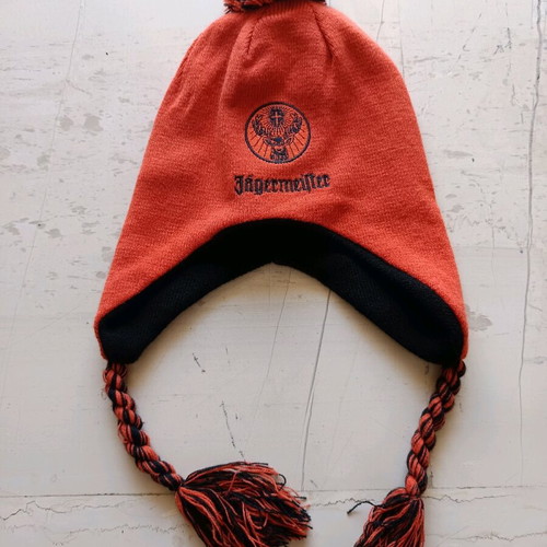 Jägermeister orange ear-flap beanie with pom-pom used like new