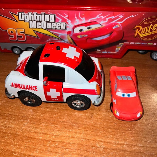 Ambulance toy car used with opening doors and pull-back mechanism