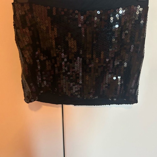 Skirt with sequins like new, black short elastic