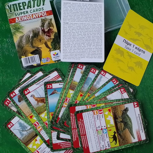 Yperatou card games used, cats and dinosaurs