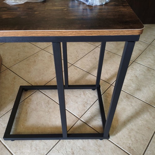 Wooden side table with metal base and wheels