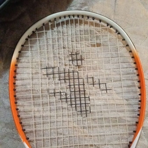 Rackets and cases used, various models including vintage Santos and Wilson