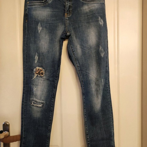 Lynne women's jeans like new with animal print and patches, size L