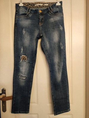 Lynne women's jeans like new with animal print and patches, size L