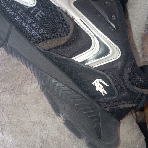 Lacoste sneakers size 44.5 used, black with repair