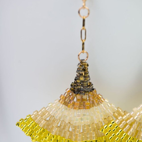 Handmade earrings with yellow and orange glass beads, steel elements