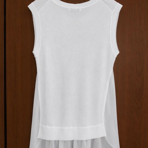 Axel white sleeveless blouse like new with asymmetric hem