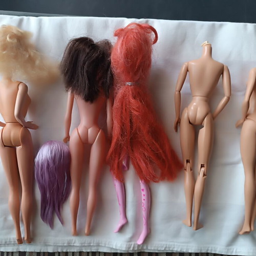 Barbie and other dolls with defects