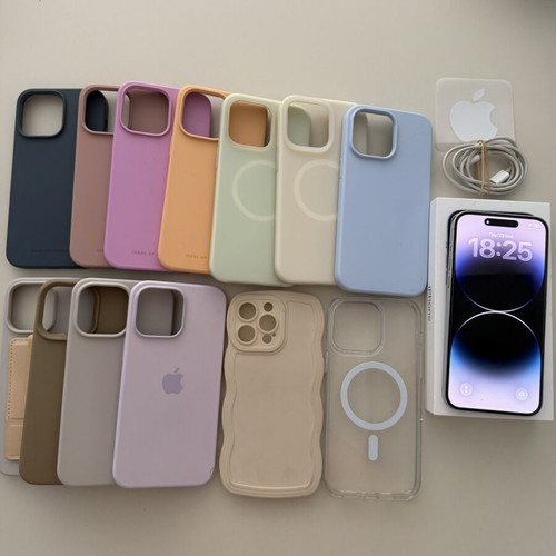 iPhone 14 Pro Max 128GB White like new with 13 cases including Apple