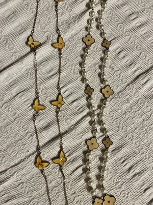Jewelry set with butterfly and flower pendants