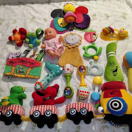 Baby rattles and toys used, set of multiple pieces