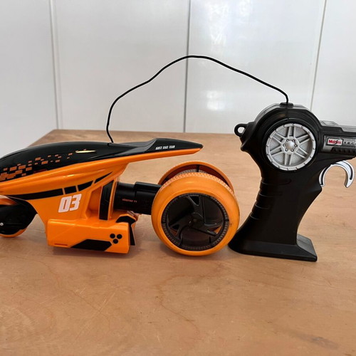 Rotating motorcycle toy used with remote control