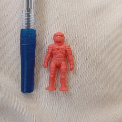 Alien figure collectible used, 4 cm, pink plastic