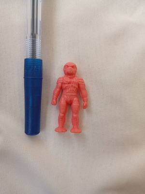 Alien figure collectible used, 4 cm, pink plastic