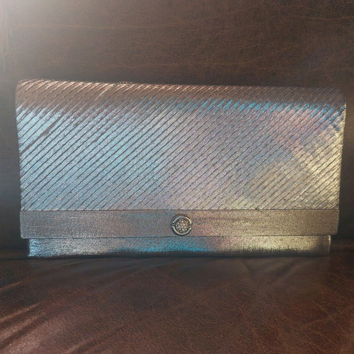 Vintage silver envelope hand bag like new with strap