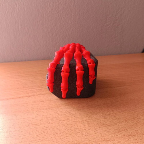 Articulated hand new, 3D printed, red PLA