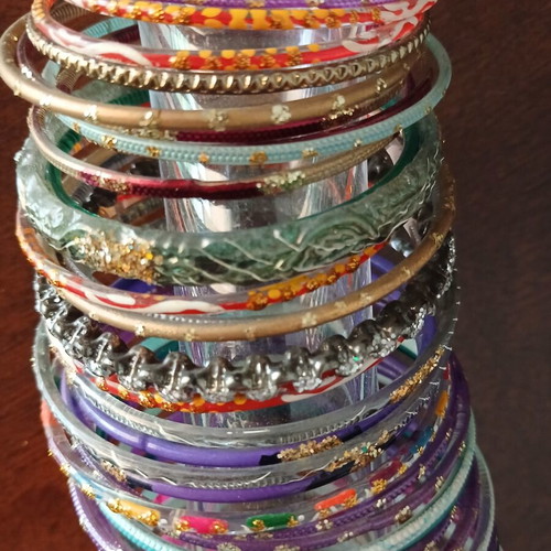 Indian glass bracelets like new, set of 54, colorful and decorated