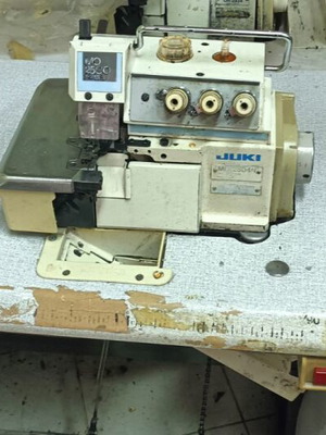 Professional overlock sewing machine used, 3-thread, set of 2