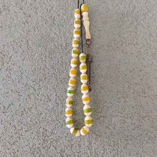 Komboloi made of camel bone with resin inlays used