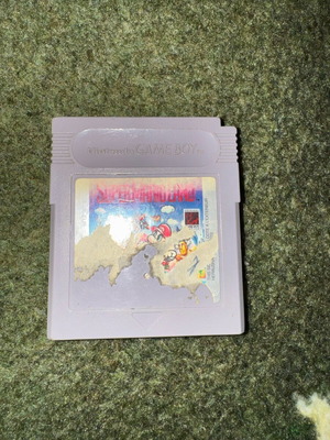 Game Boy Super Mario Land cartridge used with worn label