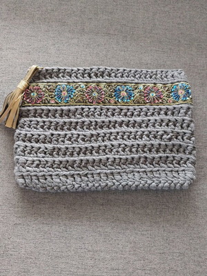 Handmade gray knitted bag new with embroidered border and tassel