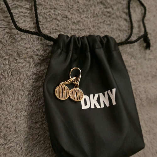 DKNY earrings like new, gold color