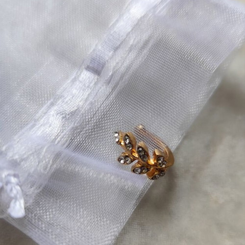 Earcuff rose gold with olive branch design and small stones like new