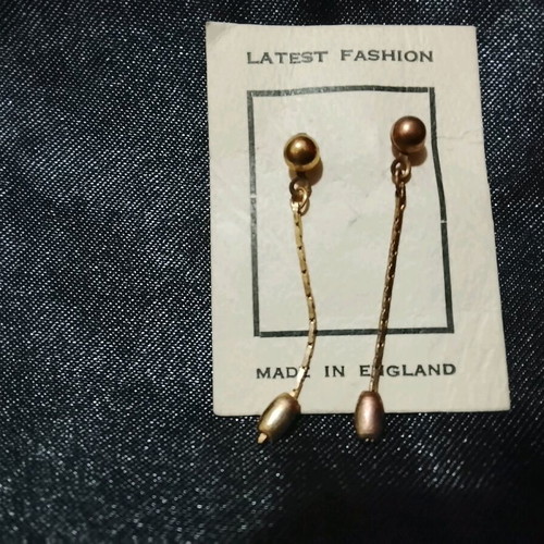 Dangling earrings new, gold color