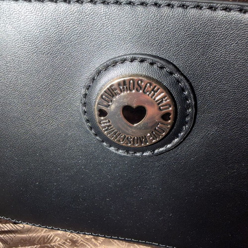 Love Moschino white backpack like new with gold details