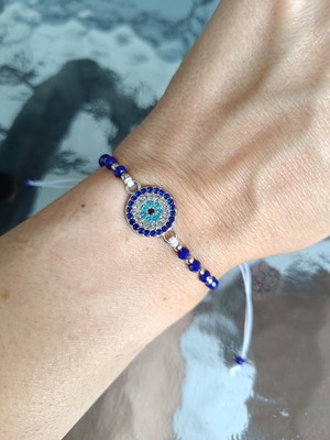 Bracelet with stones like new, adjustable with cord, blue