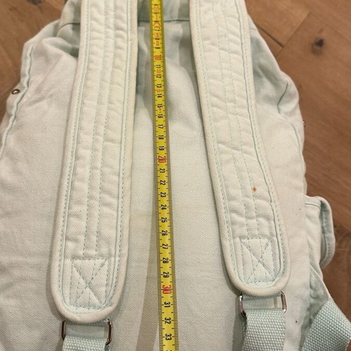 Pink backpack used, fabric turquoise with studs