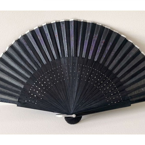 Handpainted fan used, black with floral design, wood and textile