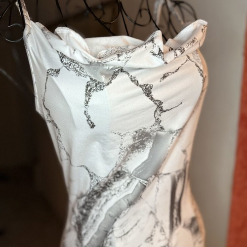 Mini dress with marble print like new, fitted with draped neckline