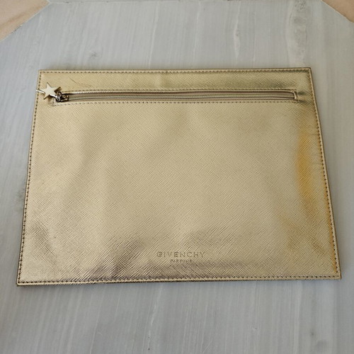 Givenchy pouch like new, gold