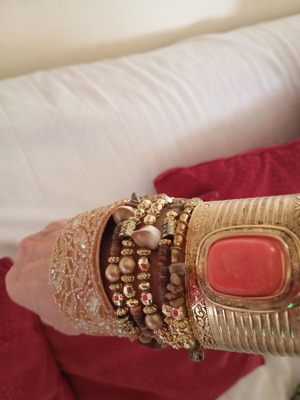 Bracelets like new, set of three, beige and gold