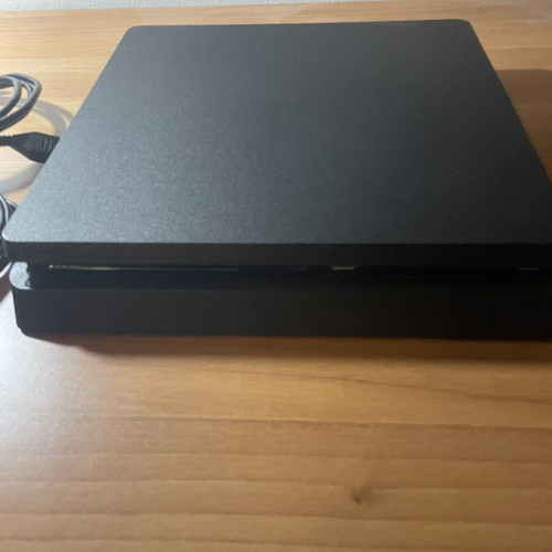 PlayStation 4 console with 2 controllers, NBA 2K25, FIFA 20, Minecraft