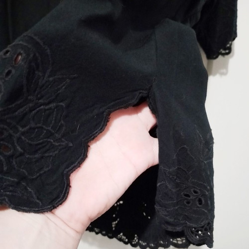 Vintage women's black blouse with embroidery used