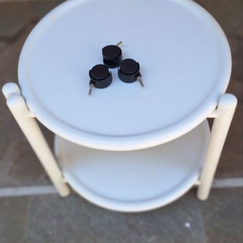White two-tier table with wheels used