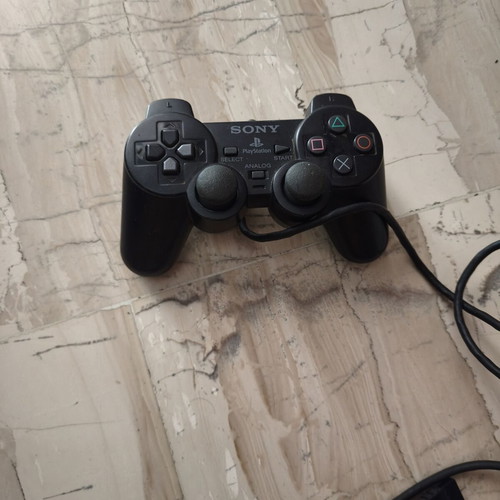 PlayStation 2 controller used, untested
