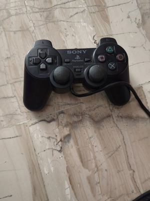 PlayStation 2 controller used, untested